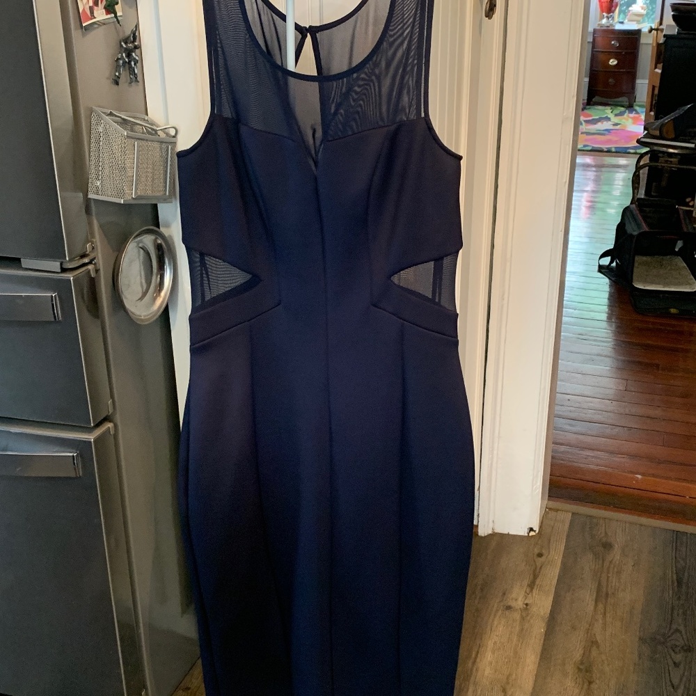 Guess mesh snd stretch dress. Never worn. Looks fantastic on